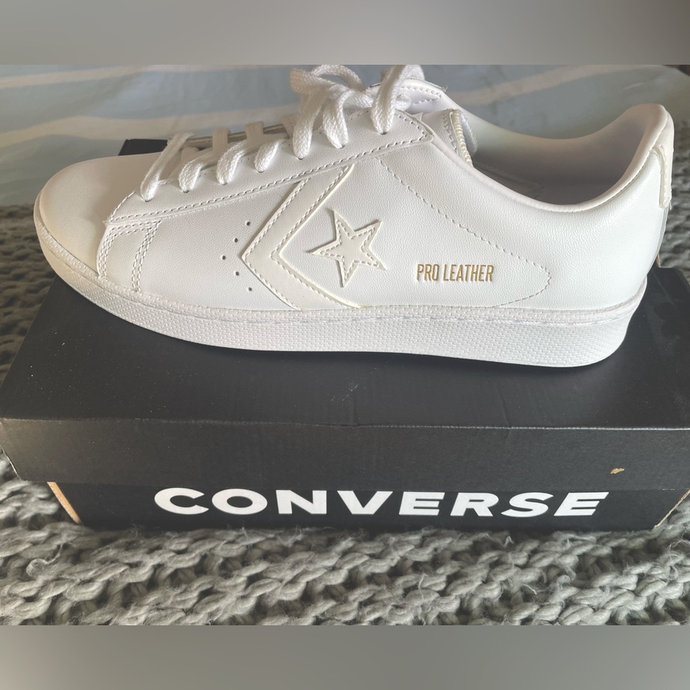 White leather low top converse
